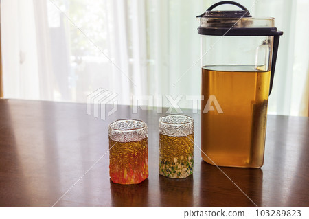 Cold barley tea on the table 103289823