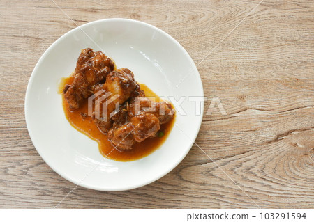 fried chicken drumsticks dressing sweet gravy sauce on plate fried chicken drumsticks dressing sweet gravy sauce on plate 103291594