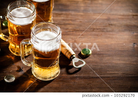 Glasses with fresh beer. 103292170