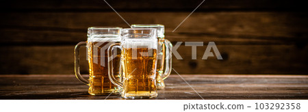 Glasses with fresh beer. 103292358