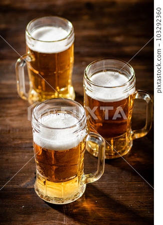 Glasses with fresh beer. 103292360