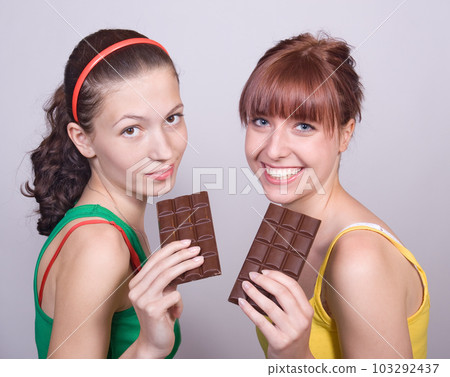 two girls with cholocate 103292437