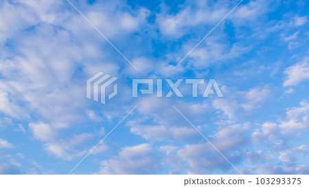 white clouds in the evening sky 103293375
