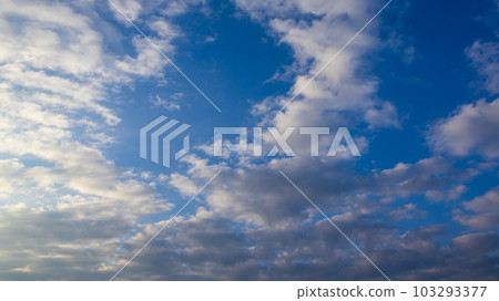 white clouds in the evening sky 103293377