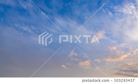 white clouds in the evening sky white clouds in the evening sky 103293437