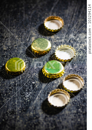 Several beer bottle caps. Several beer bottle caps. 103294114