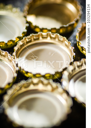 Several beer bottle caps. Several beer bottle caps. 103294134