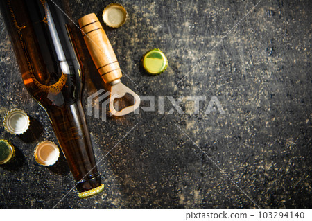 Beer bottle and opener. Beer bottle and opener. 103294140