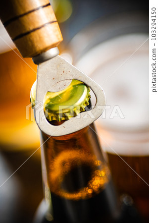 Beer bottle and opener. Beer bottle and opener. 103294150