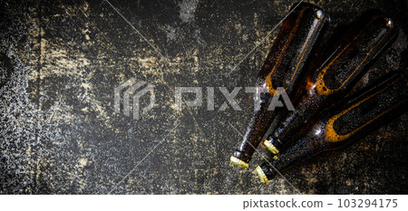 Fresh beer in closed bottles. Fresh beer in closed bottles. 103294175