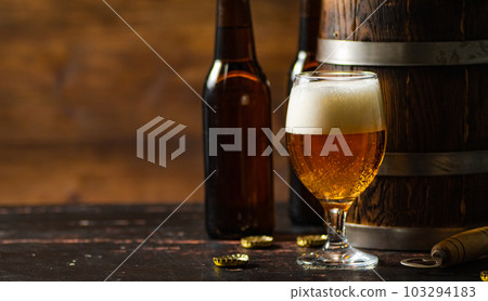 Glass with fresh beer. Glass with fresh beer. 103294183