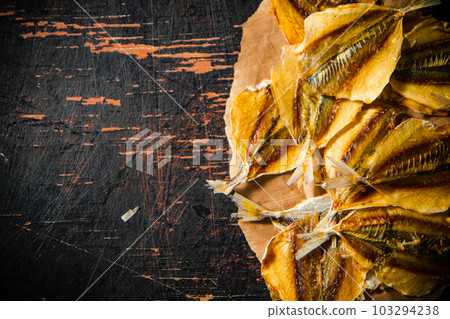 Dried and salted fish, beer snack. Dried and salted fish, beer snack. 103294238