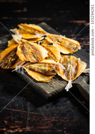 Dried and salted fish, beer snack. Dried and salted fish, beer snack. 103294261