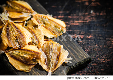 Dried and salted fish, beer snack. Dried and salted fish, beer snack. 103294262