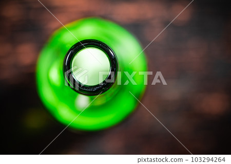 Beer bottle with fresh beer. Beer bottle with fresh beer. 103294264