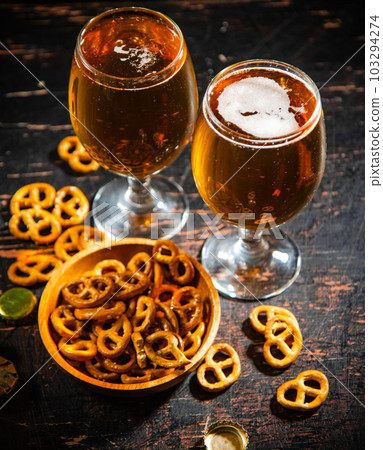 Beer with salty pretzels. Beer with salty pretzels. 103294274