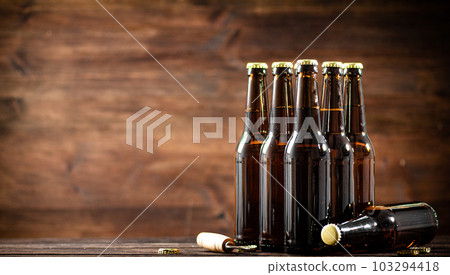 Fresh beer bottles. 103294418