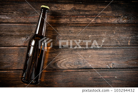 Fresh beer bottle. 103294432