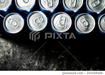 Fresh beer in cans. 103294489