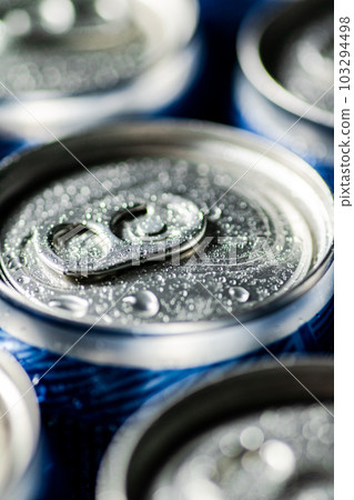 Fresh beer in cans. 103294498