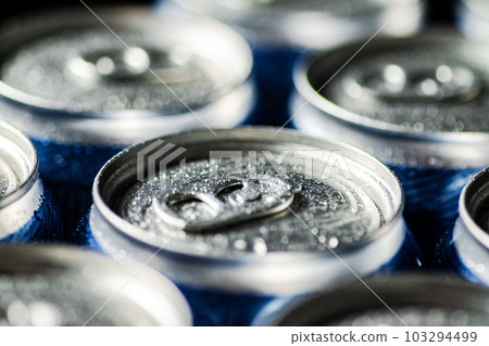 Fresh beer in cans. 103294499