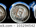 Fresh beer in cans. 103294542