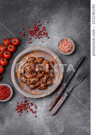 Chicken hearts fried in soy sauce with salt and spices in a plate Chicken hearts fried in soy sauce with salt and spices in a plate 103296280