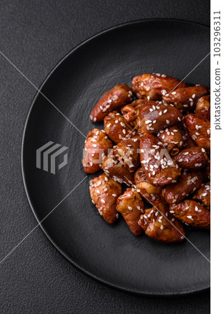 Chicken hearts fried in soy sauce with salt and spices in a plate Chicken hearts fried in soy sauce with salt and spices in a plate 103296311