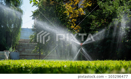 Automatic lawn sprinkler. Humidification of the grass in the dry summer period. 103296477