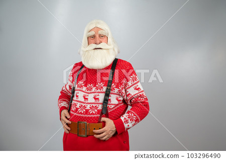 Elderly man dressing up as santa claus on white background. Elderly man dressing up as santa claus on white background. 103296490