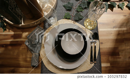 Dinning table set at home, tableware, glasses, spoon and fork. Dinning table set at home, tableware, glasses, spoon and fork. 103297832