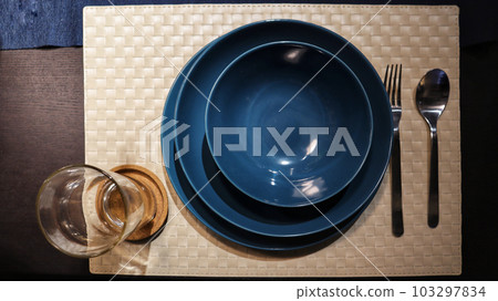 Dinning table set at home, tableware, glasses, spoon and fork. Dinning table set at home, tableware, glasses, spoon and fork. 103297834