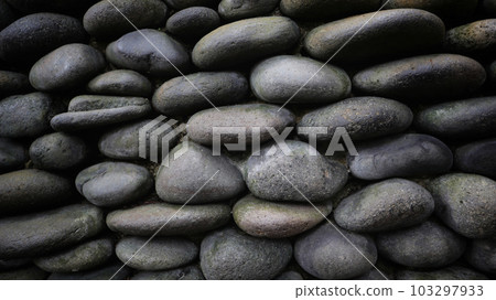 Photos of stones arranged on walls and plastered so that they look attractive as wallpaper and background. Photos of stones arranged on walls and plastered so that they look attractive as wallpaper and background. 103297933