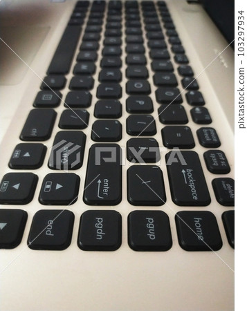 Close up laptop black keyboard from left side. Close up laptop black keyboard from left side. 103297934