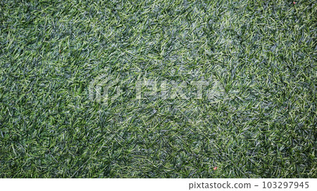 photos of green synthetic grass for wallpapers and backgrounds. 103297945