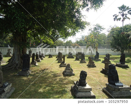 Small statue look like cemetery Buddhist Prambanan temple complex the largest temple in java, Central Java, Indonesia. 103297950