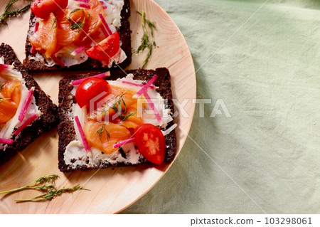 Black bread open sandwich with smoked salmon Black bread open sandwich with smoked salmon 103298061