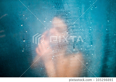 Girl takes a shower, washes her hair. Girl takes a shower, washes her hair. 103298891