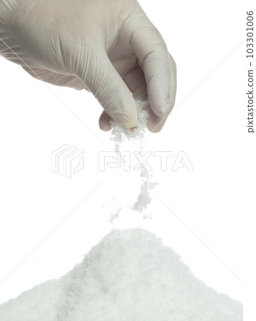 Salt pouring fall down from hand finger, great big white salts flower explode abstract cloud fall. Heap of Salt rock mix with ground powder, seasoning element design. White background isolated Salt pouring fall down from hand finger, great big white salts flower explode abstract cloud fall. Heap of Salt rock mix with ground powder, seasoning element design. White background isolated 103301006