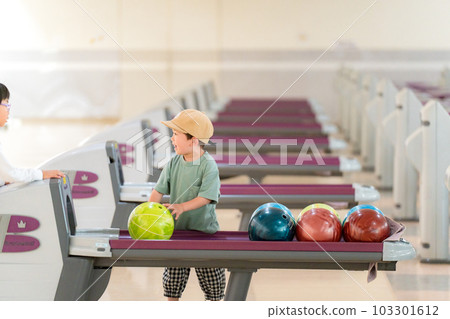 children playing in the bowling alley 103301612
