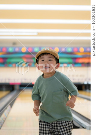 children playing in the bowling alley children playing in the bowling alley 103301633