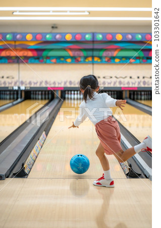 children playing in the bowling alley children playing in the bowling alley 103301642