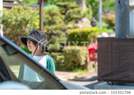 A housewife checking on the neighborhood Neighborhood trouble A housewife checking on the neighborhood Neighborhood trouble 103301706