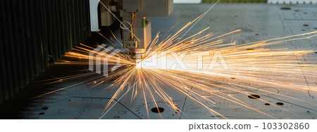 CNC machine. Laser cutting of metal. Sparks. CNC machine. Laser cutting of metal. Sparks. 103302860