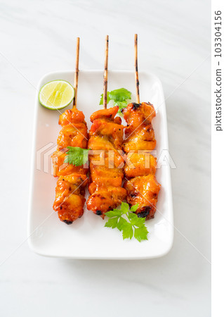 grilled chicken skewer with herbs and spices 103304156