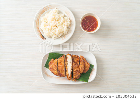 fried chicken with sticky rice fried chicken with sticky rice 103304532