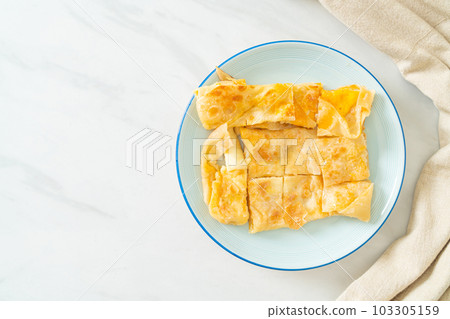 roti with egg and sweetened condensed milk 103305159