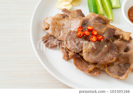 grilled pork neck sliced on plate 103305166
