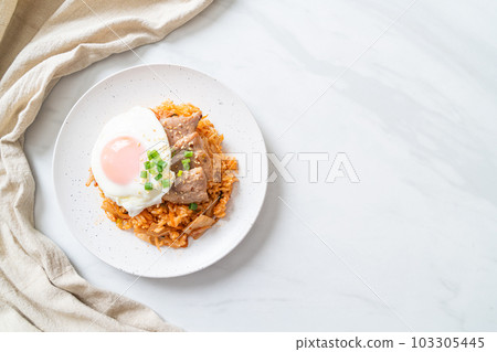 Kimchi fried rice with fried egg and pork Kimchi fried rice with fried egg and pork 103305445