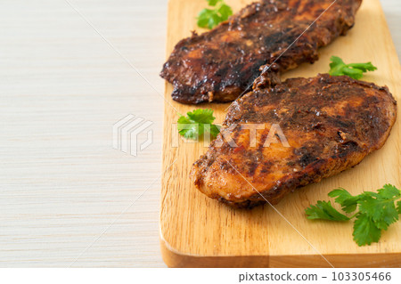 spicy grilled jamaican jerk chicken 103305466